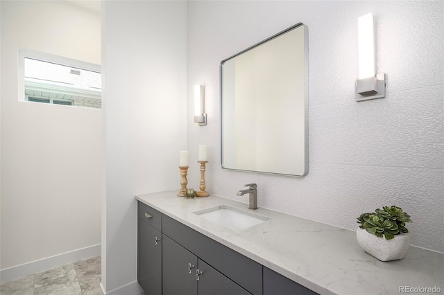 bathroom featuring vanity and tile floors