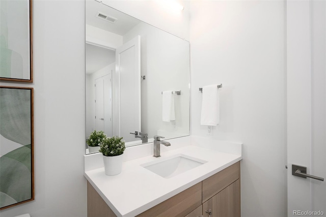 bathroom featuring oversized vanity