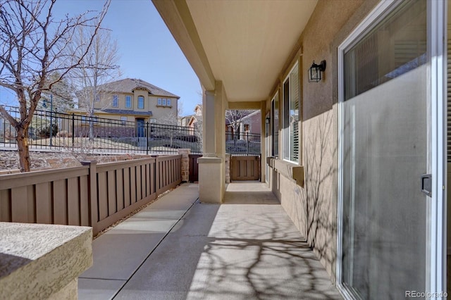 view of patio featuring fence