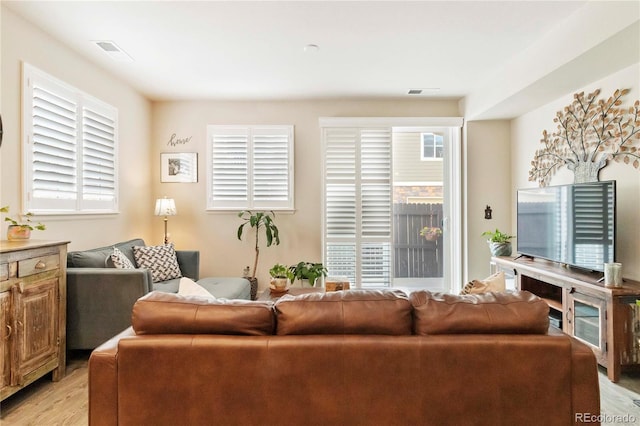 1640 Aspen Meadows Cir, Federal Heights, CO 80260 - living area featuring light wood finished floors