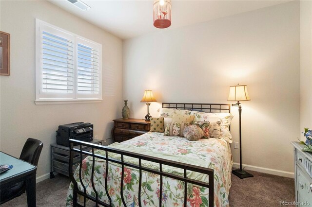 1640 Aspen Meadows Cir, Federal Heights, CO 80260 - carpeted bedroom with baseboards and a desk