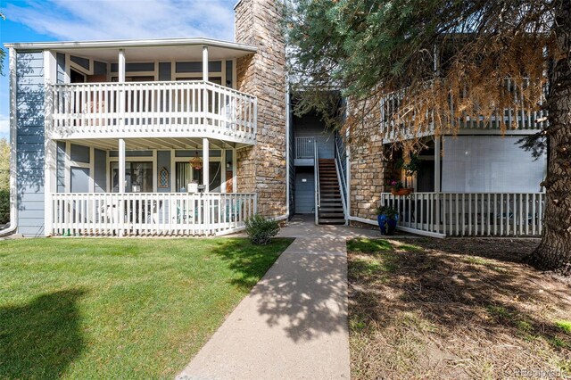 view of front of home with a front yard