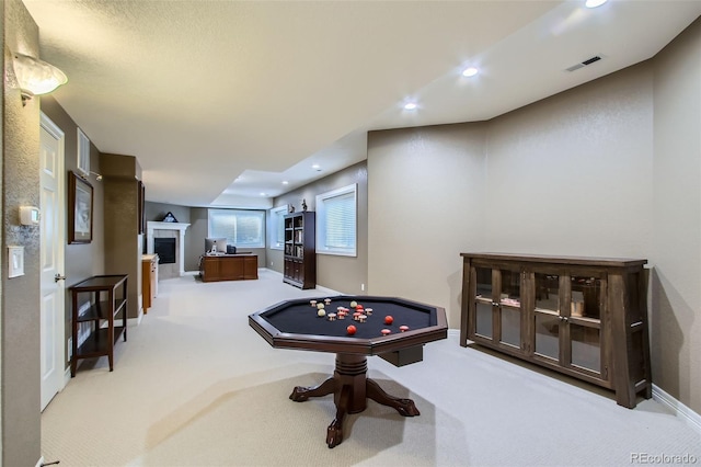 7355 Nile St, Arvada, CO 80007 - playroom featuring carpet floors, recessed lighting, and a fireplace