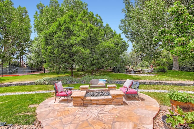 7355 Nile St, Arvada, CO 80007 - view of patio / terrace featuring an outdoor fire pit