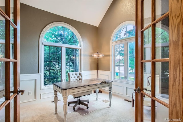 7355 Nile St, Arvada, CO 80007 - office area with french doors, a decorative wall, plenty of natural light, carpet flooring, and a wainscoted wall