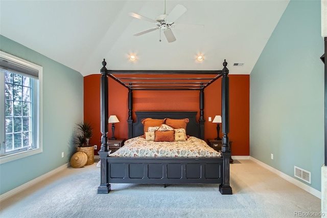 7355 Nile St, Arvada, CO 80007 - bedroom with light colored carpet, vaulted ceiling, and a ceiling fan