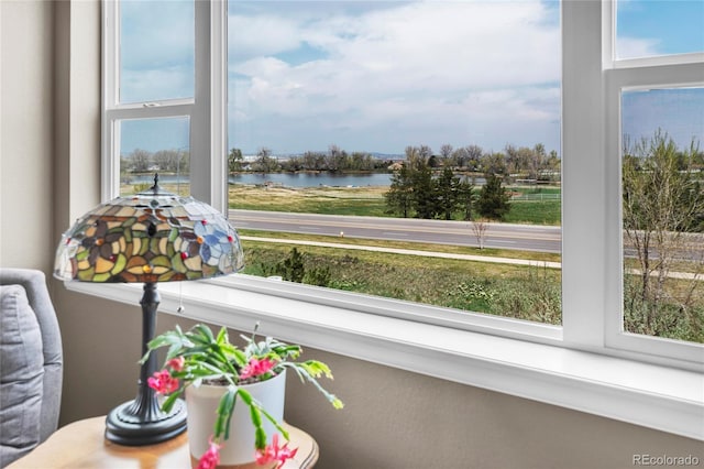 sunroom with a water view