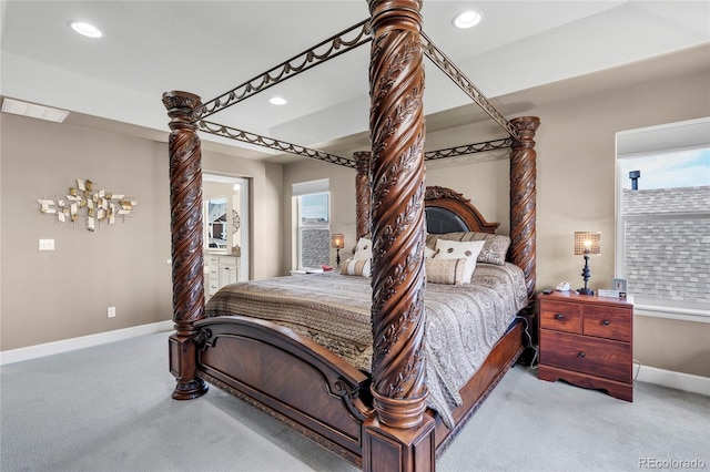 bedroom featuring carpet flooring, baseboards, recessed lighting, and connected bathroom
