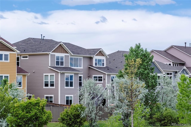 3421 E 143rd Dr, Thornton, CO 80602 - back of house with fence and board and batten siding