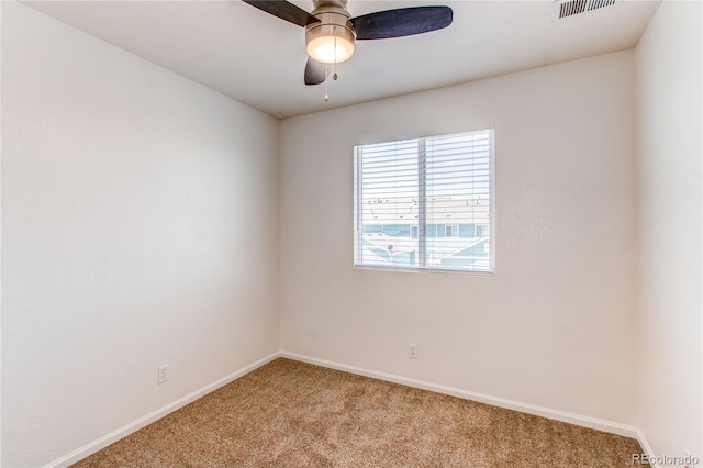 19043 E 58th Ave, Denver, CO 80249 - spare room with light colored carpet and ceiling fan
