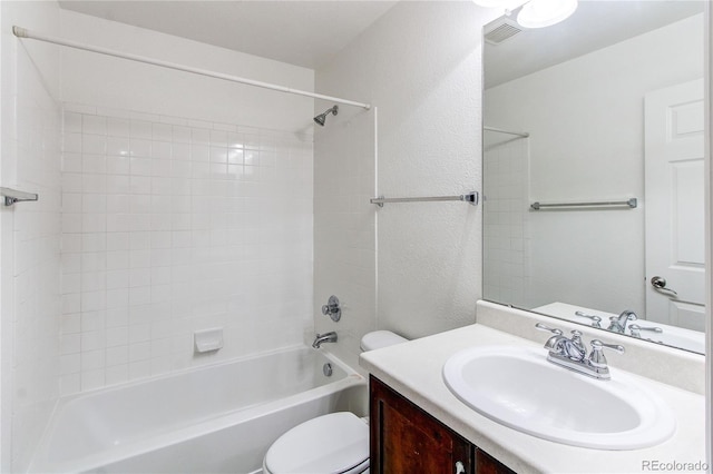 19043 E 58th Ave, Denver, CO 80249 - full bath with vanity, shower / bath combination, and a textured wall