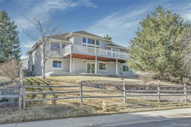 view of front facade with a fenced front yard