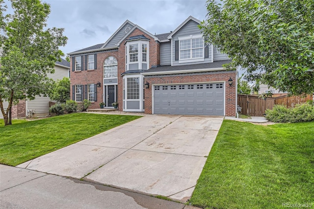 9458 S Hackberry Ln, Highlands Ranch, CO 80129 - traditional-style house featuring brick siding, concrete driveway, and an attached garage