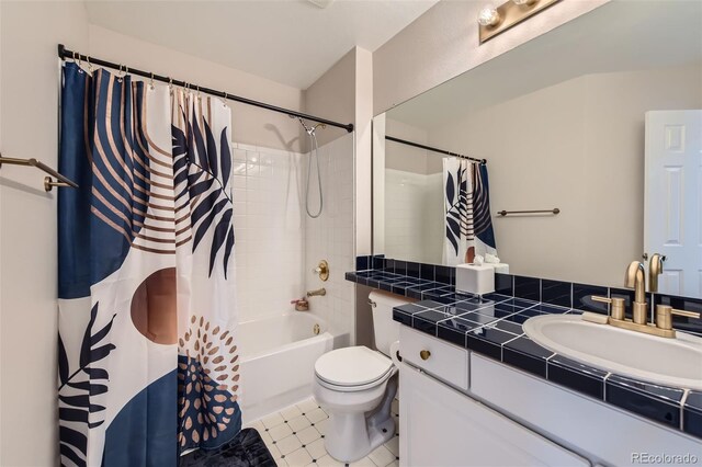 9458 S Hackberry Ln, Highlands Ranch, CO 80129 - bathroom with vanity, shower / bathtub combination with curtain, and toilet