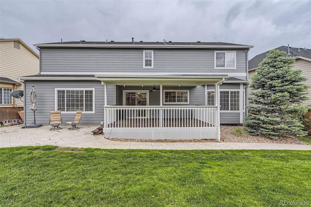 9458 S Hackberry Ln, Highlands Ranch, CO 80129 - back of property with a patio and a yard