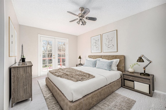 9712 Adams St, Thornton, CO 80229 - carpeted bedroom featuring french doors, access to outside, a textured ceiling, baseboards, and a ceiling fan