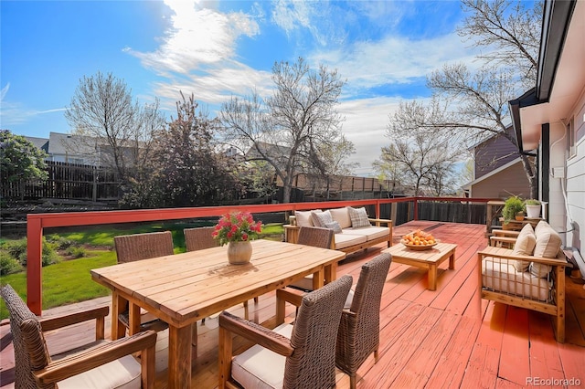 9712 Adams St, Thornton, CO 80229 - wooden deck with a fenced backyard and outdoor lounge area