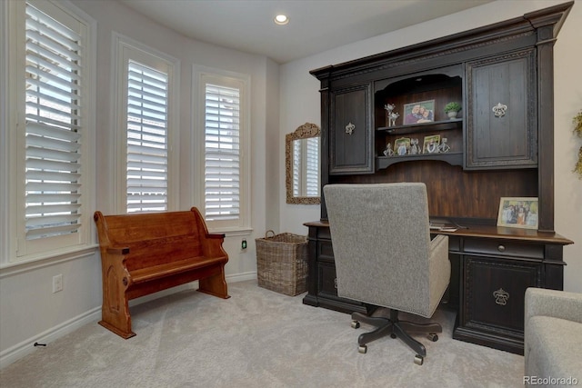 home office with light colored carpet