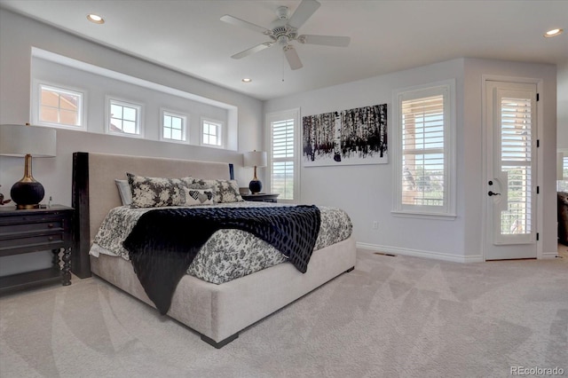 bedroom with access to exterior, ceiling fan, and carpet floors