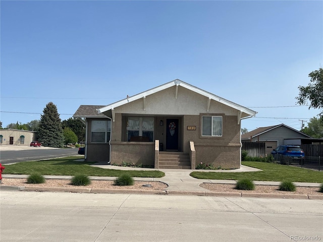 790 4th St, Limon, CO 80828 - bungalow with stucco siding and a porch