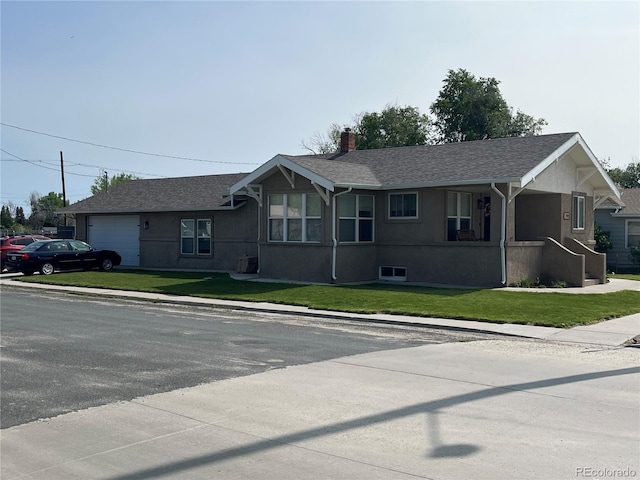 790 4th St, Limon, CO 80828 - ranch-style house featuring an attached garage, a front yard, a chimney, and stucco siding