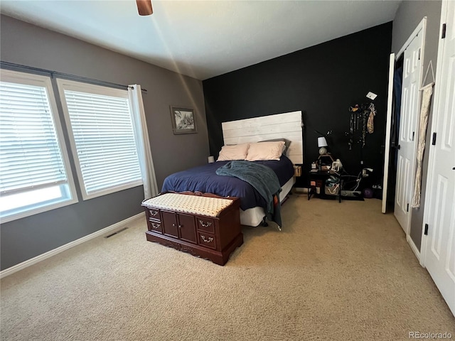 790 4th St, Limon, CO 80828 - bedroom with light carpet, baseboards, and ceiling fan