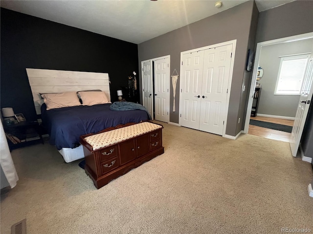 790 4th St, Limon, CO 80828 - bedroom with multiple closets, light carpet, and baseboards