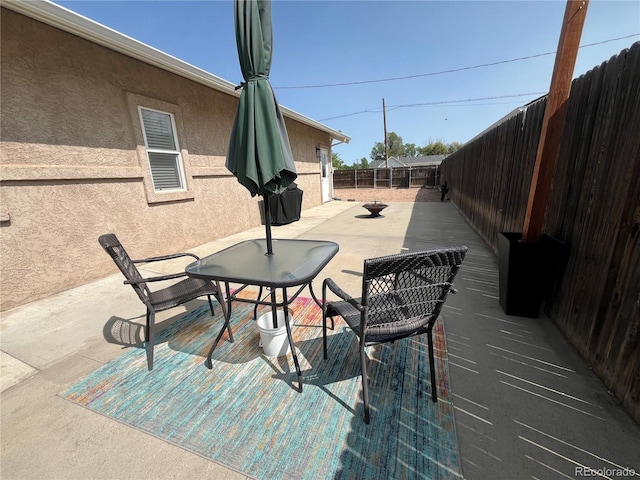 790 4th St, Limon, CO 80828 - fenced backyard featuring outdoor dining area and a patio area