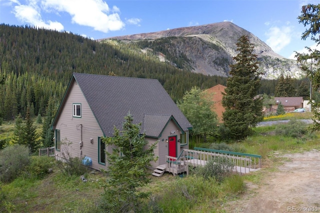 exterior space featuring a mountain view