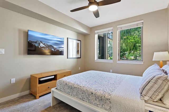 bedroom featuring carpet flooring and ceiling fan