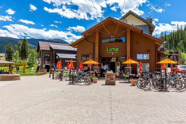 view of building exterior with a mountain view