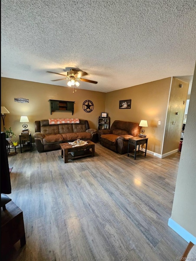 2034 S Truckee St, Aurora, CO 80013 - living room with ceiling fan, a textured ceiling, and wood finished floors
