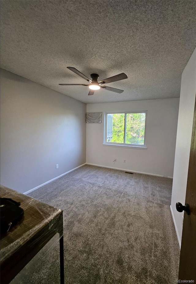 2034 S Truckee St, Aurora, CO 80013 - carpeted empty room with ceiling fan and a textured ceiling