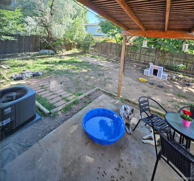 2034 S Truckee St, Aurora, CO 80013 - fenced backyard with a patio area