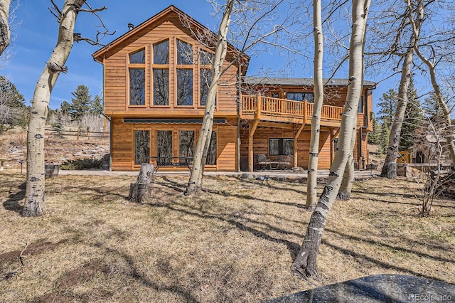 44 Forest Ridge Cir, Bailey, CO 80421 - back of house featuring a deck