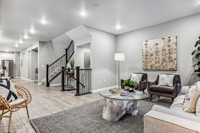 living room featuring light wood-type flooring