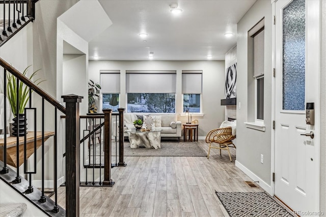 foyer featuring light hardwood / wood-style flooring