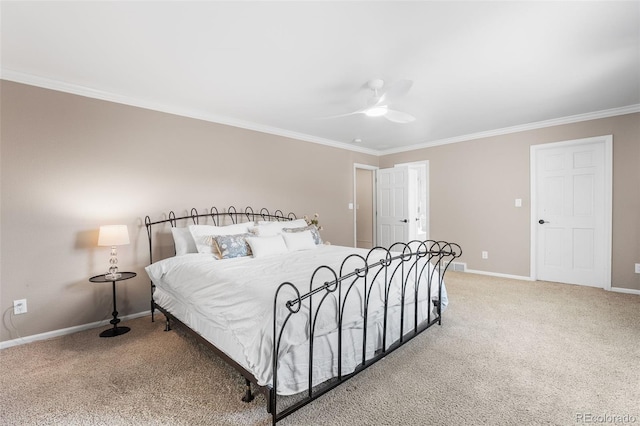 bedroom featuring carpet floors, ornamental molding, and ceiling fan