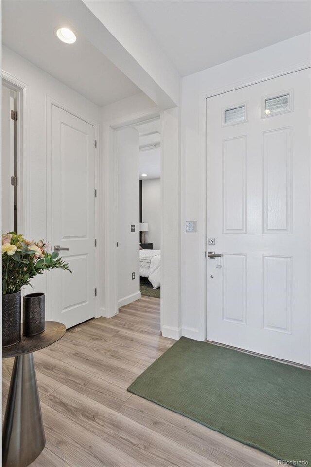 25106 E 1st Ave, Aurora, CO 80018 - entryway featuring light wood-style floors and recessed lighting