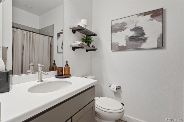25106 E 1st Ave, Aurora, CO 80018 - bathroom featuring vanity and curtained shower
