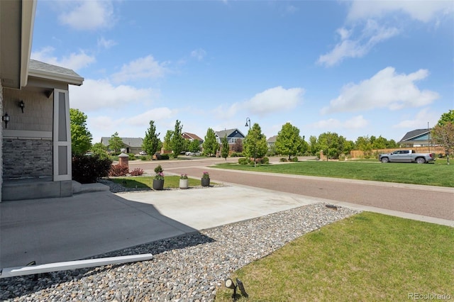 25106 E 1st Ave, Aurora, CO 80018 - view of grassy yard featuring a residential view