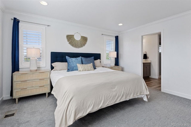 25106 E 1st Ave, Aurora, CO 80018 - carpeted bedroom featuring crown molding, recessed lighting, and ensuite bath
