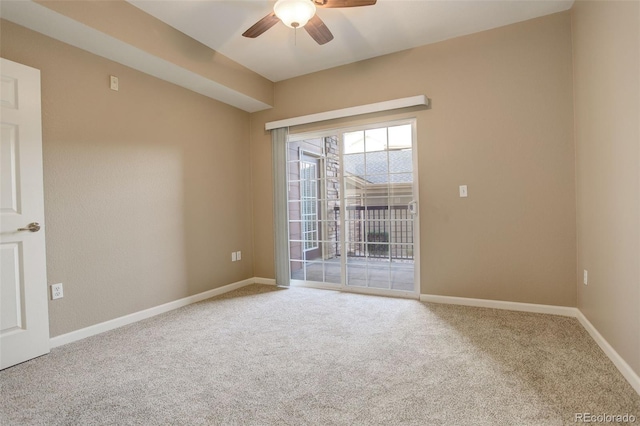 carpeted empty room with ceiling fan