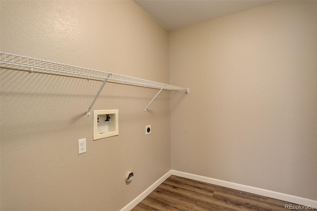 laundry room with hookup for an electric dryer, dark hardwood / wood-style flooring, and hookup for a washing machine