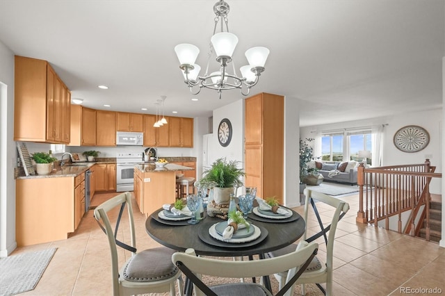 2845 Cherry Way, Parker, CO 80138 - dining space with light tile patterned flooring, a chandelier, and recessed lighting