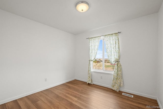 2845 Cherry Way, Parker, CO 80138 - unfurnished room with wood finished floors and baseboards
