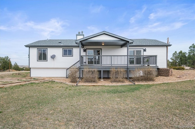 2845 Cherry Way, Parker, CO 80138 - back of house with a lawn, a chimney, a wooden deck, and a shingled roof