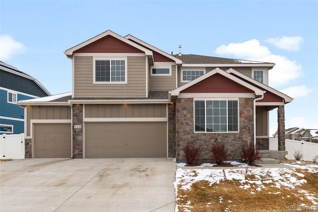 craftsman inspired home featuring a garage