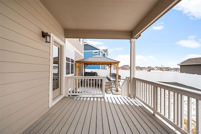 wooden deck featuring a gazebo