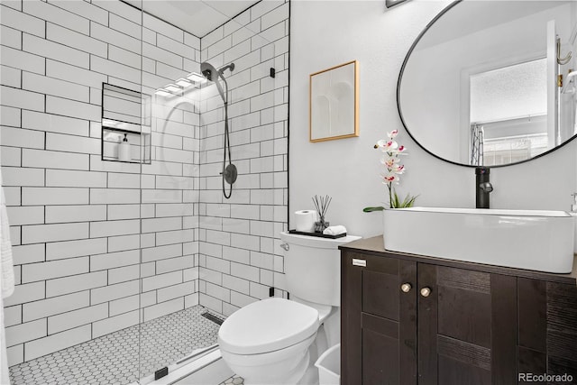 5155 W 68th Ave Unit 5, Westminster, CO 80030 - full bath featuring toilet, vanity, and tiled shower